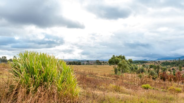 Dark clouds hovering over the farm lands of the highland areas of Madagascar