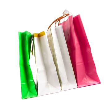 Assorted colored shopping bags on a white background