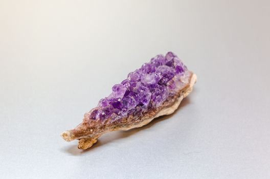 Raw Amethyst crystal. The crystal is a variety of the mineral quartz