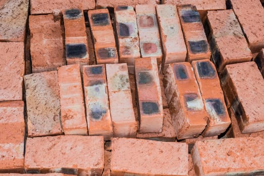 Bricks for new house stacked neatly on top of each other.