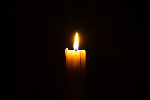 Candle in the dark with copyspce