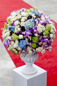 Bouquet of colorful flowers in ceramic vase