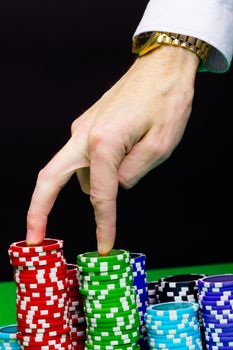 Man's hand and stairs of the chips. step Forward