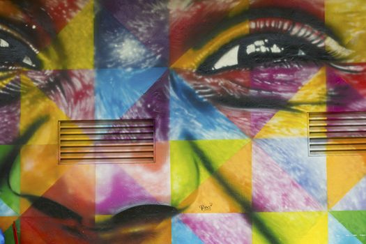 SAO PAULO, BRAZIL – FEBRUARY 01, 2015: A big and color mural on the wall from Brazilian graffiti artist Kobra at Ibirapuera Park in Sao Paulo Brazil.