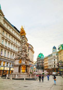 VIENNA - OCTOBER 19: The Pestsaule (Plague Column) at Graben street on October 20, 2014 in Vienna. It's one of the most well-known and prominent pieces of sculpture in the city.