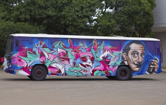 SAO PAULO, BRAZIL - FEBRUARY 01, 2015: A bus painted with grafiti art design exposed in the Ibirapuera Park at Sao Paulo Brazil.