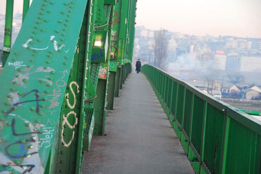 green fence and construction of old Sava bridge in Belgrade, Serbia