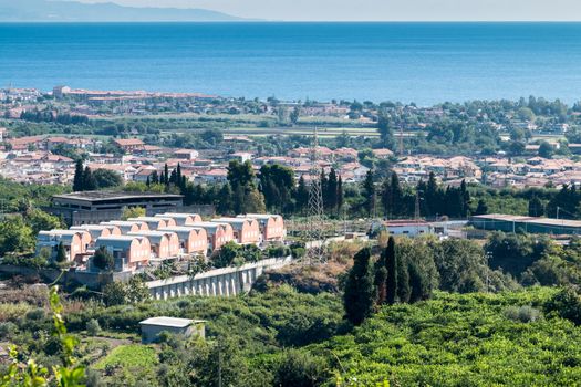 View of Mascali with the sea shimmering reflections