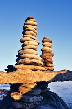 Pyramidal group of stones on the seashore