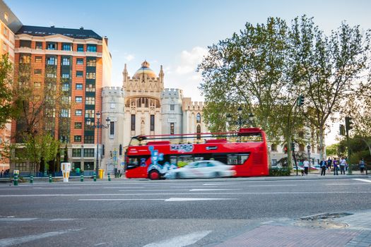 Madrid, Spain - May 10, 2012: Church of Saint Theresa and St. Jose (Iglesia de Santa Teresa y San Jose) with double decker tourist bus on front on a spring day in Madrid, Spain