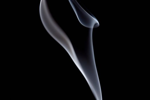 White smoke on a black background