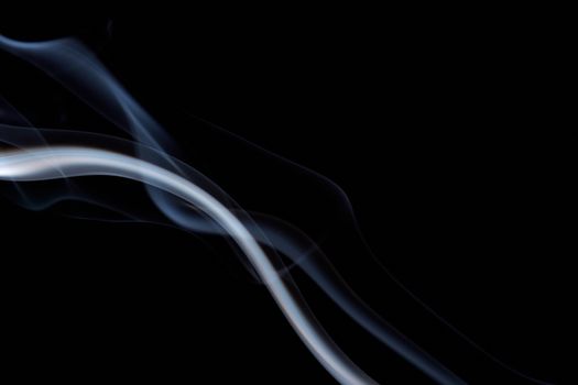 White smoke on a black background