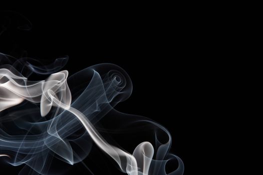 White smoke on a black background