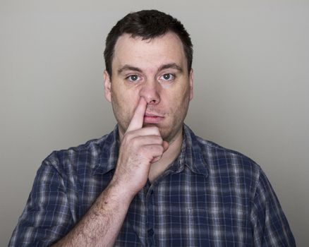 Picking a nose this guy can spread a disease this way.