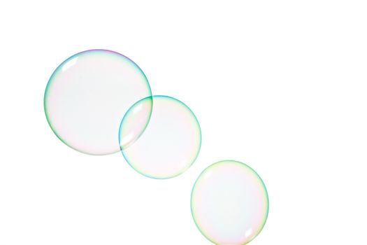 Group of soap bubbles on a white background