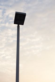 Recessed lighting in public. In the background is the sky in the evening.