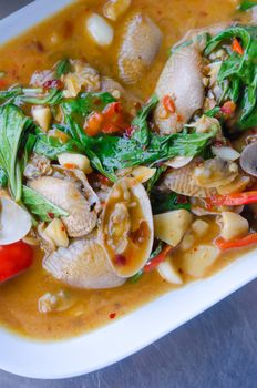 Stir fried clams with roasted chili paste and thai basil leaves