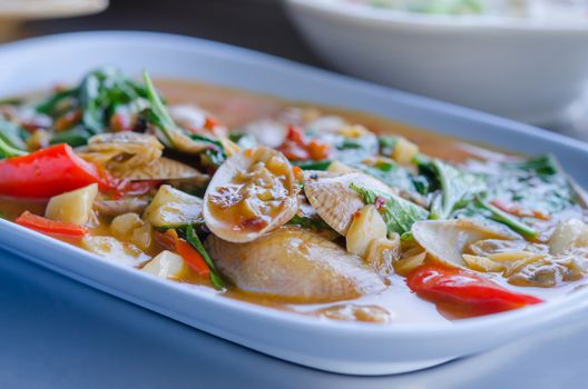 Stir fried clams with roasted chili paste and thai basil leaves