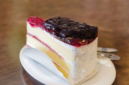 close up blueberry cheese cake on dish