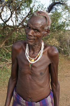 TURMI, ETHIOPIA - NOVEMBER 18, 2014: Portrait of an old Hamer man on November 18, 2014 in Turmi, Ethiopia.