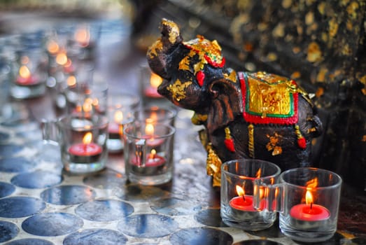 Candles with an elephant sculpture sacrifice in the temple.







Candles with an elephant sculpture sacrifice