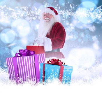 Santa carries red gift bag against light glowing dots design pattern