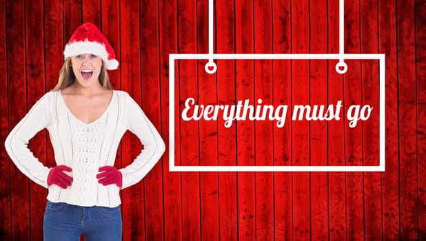 Festive blonde shouting at camera against red wooden planks background