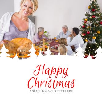 Proud mother showing roast turkey against happy christmas