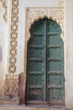 ancient decorative ornate door in asia, Rajasthan, India