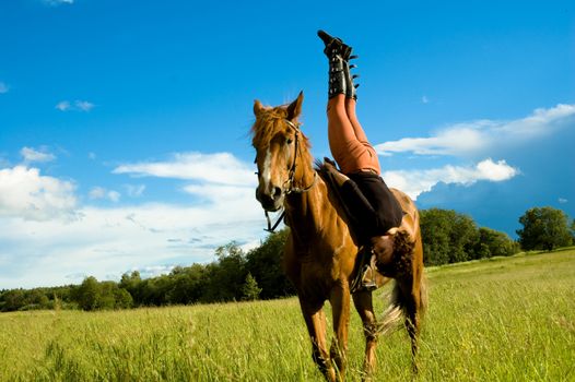 Woman ride on the horse in nature