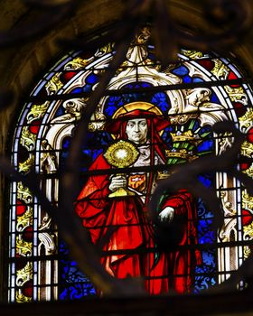 Red Cardinal Catholic Church Holding Chalice Stained Glass Salamanca New Cathedral Castile Spain. The New and Old Cathedrals in Salamanca are right next to each other.  New Cathedral was built from 1513 to 1733 and commissioned by Ferdinand V of Castile, Spain.