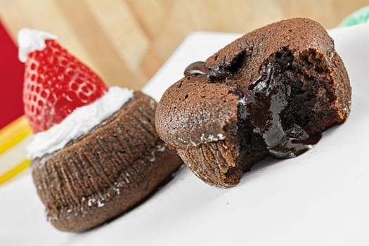 chocolate cake with soft heart and chocolate cake with hat of Santa Claus