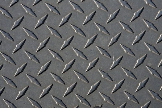 Closeup of real diamond plate metal material.