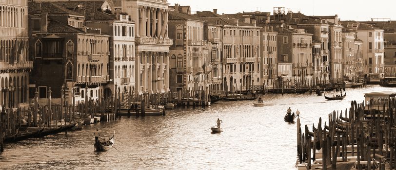 VENICE, ITALY - SEPTEMBER 21: Grand Canal of Venice on September 21, 2013.The famous Grand Canal from Rialto bridge at sunset.  In Sepia toned. Retro style