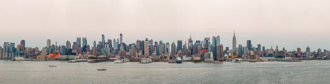 Panoramic view of Manhattan skyline with densely packed skyscrapers