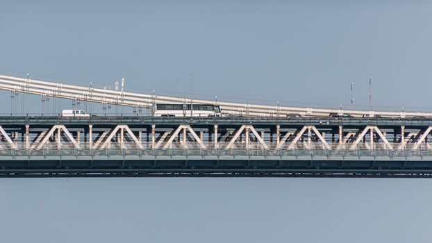 Cars and busses crossing Manhattan bridge as they travel between Queens and Manhattan