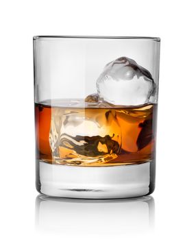 Glass of whiskey with ice isolated on white