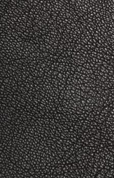 Black leather texture closeup.