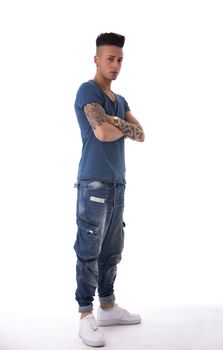 Full length shot of trendy young man standing isolated on white background