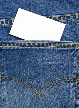 Blank card with copy space in a pocket of blue jeans