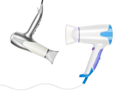 Two hairdryers isolated on white
