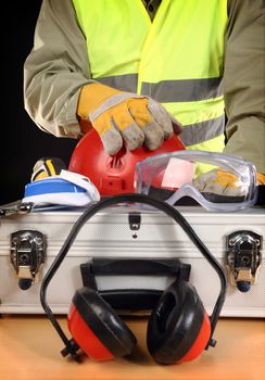 Safety equipment set and worker, close up