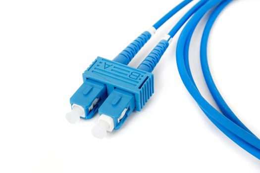 blue fiber optic duplex SC connector patchcord on white background