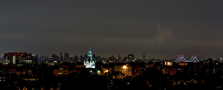 The view of Manhattan skyline at night from Queens, New York