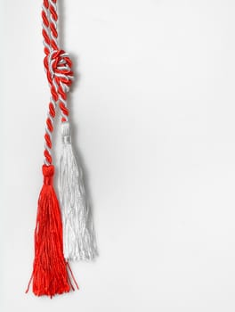 March 1 traditional trinket symbol with white and red silk or wool ropes