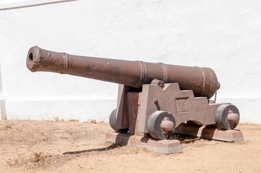 Rusty old cannon at the historic Powder Magazine in Stellenbosch in the Western Cape Province of South Africa
