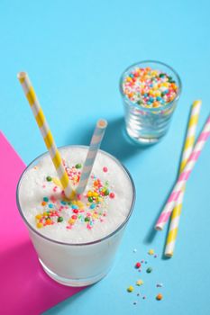  Glass of milk and Sprinkles with paper straws