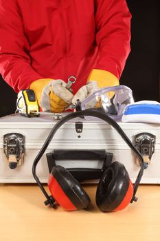 Safety equipment set and worker, close up