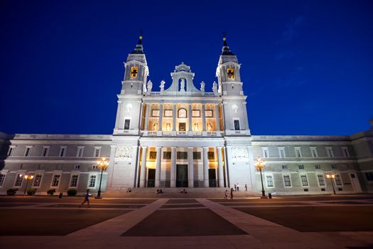 Madrid, Spain - May 10, 2012: Cathedral Almudena with tourists on a spring night in Madrid, Spain