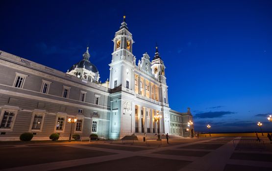 Madrid, Spain - May 10, 2012: Cathedral Almudena with tourists on a spring night in Madrid, Spain
